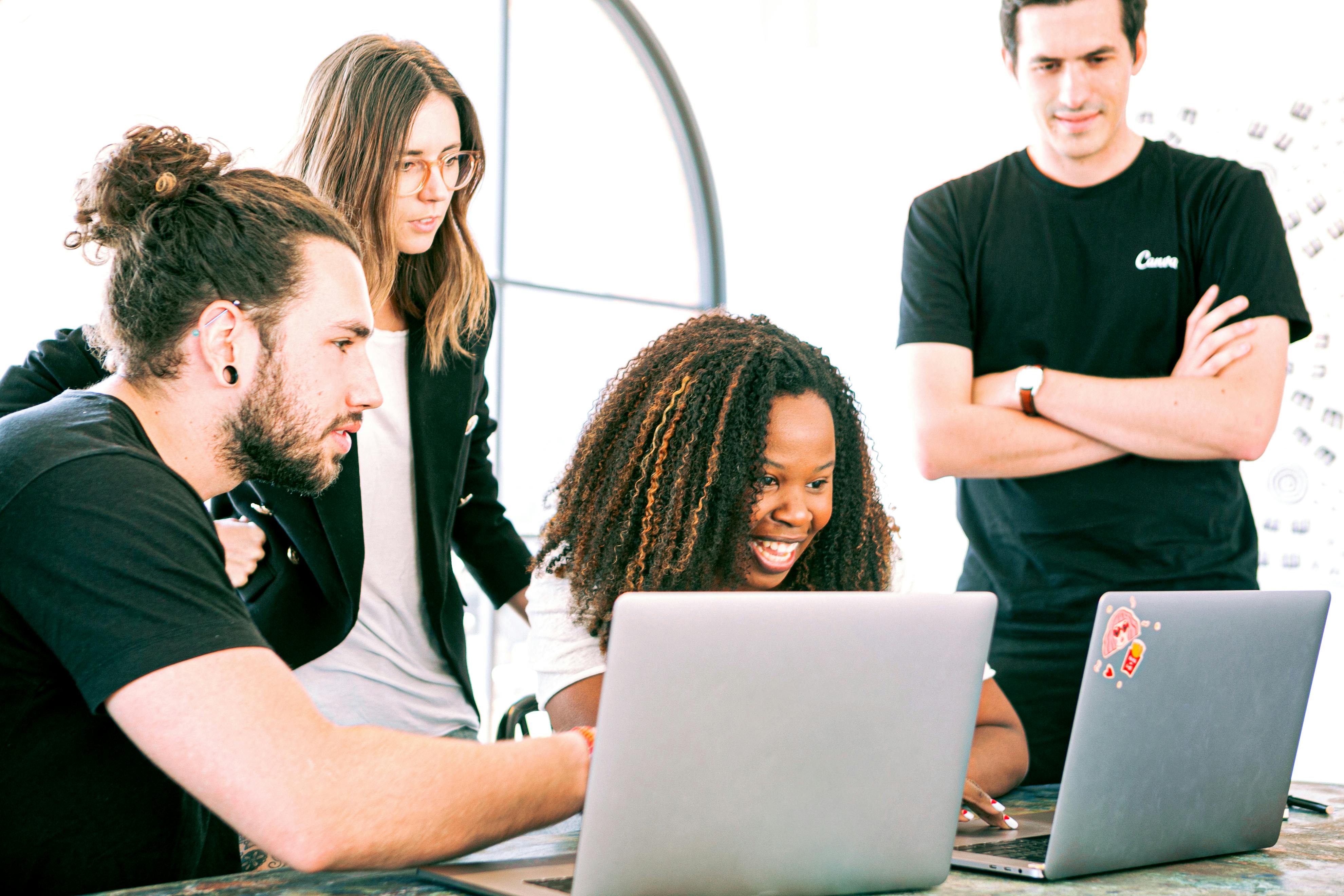 Multiple people on computer