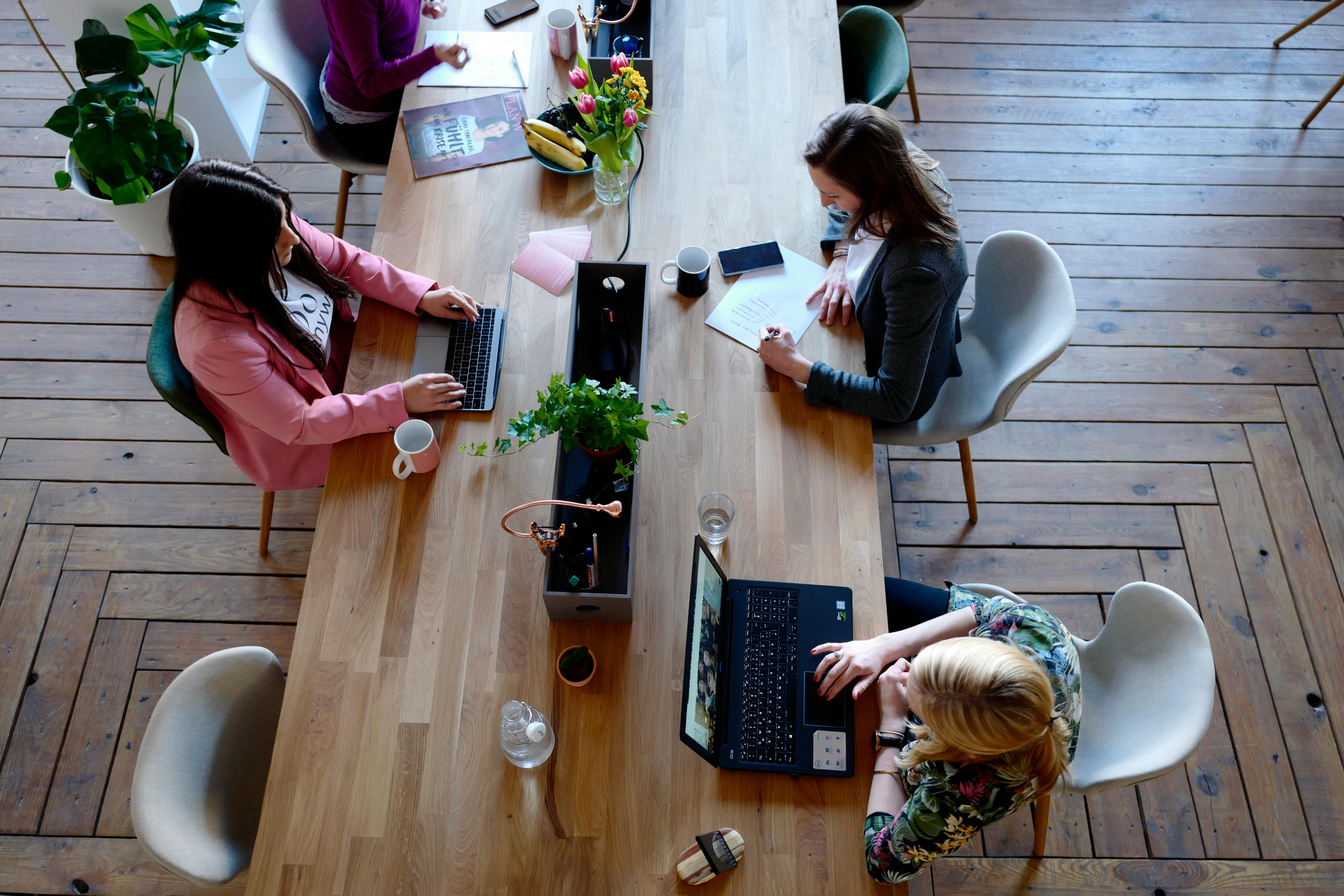 People on computers at desk